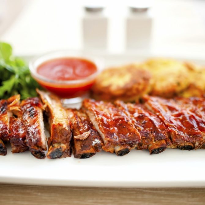 main dish - pork ribs and barbeque sauce with parsley and bread
